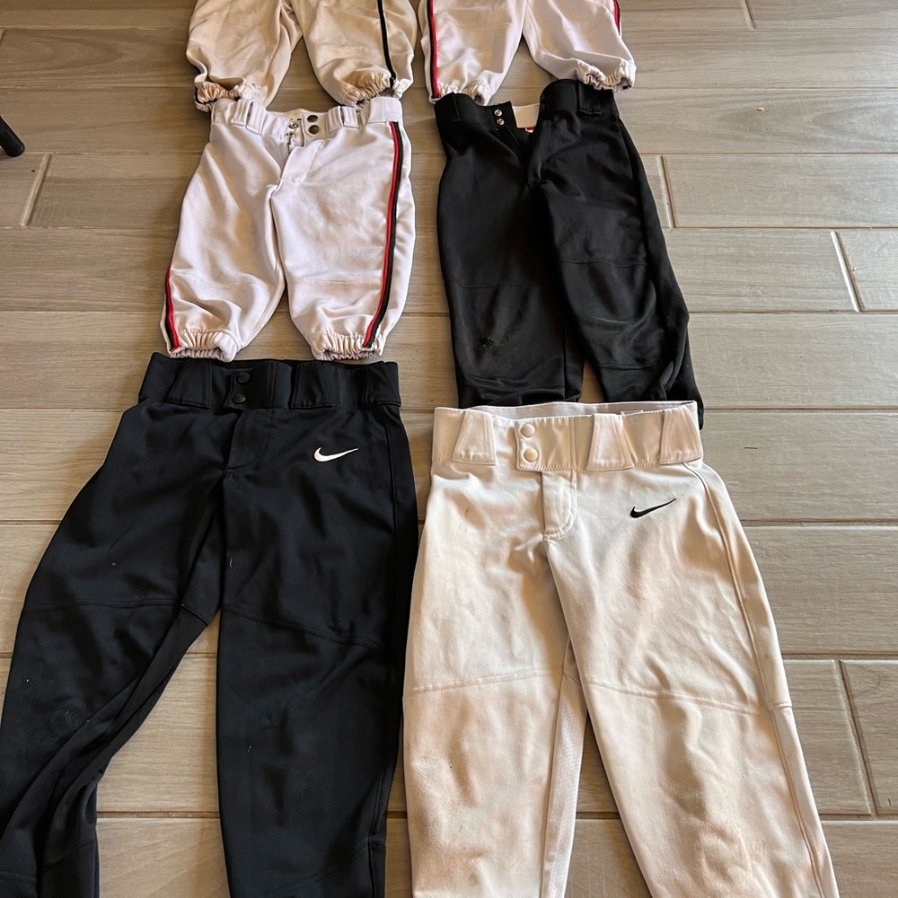 Selling 6 pair of YS baseball practice pants. 2 long leg and 4 knicker style